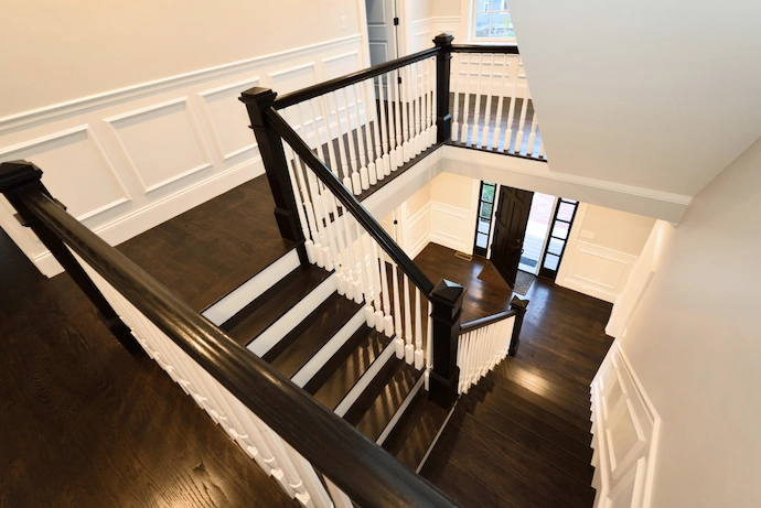 custom brown staircase in a luxury home