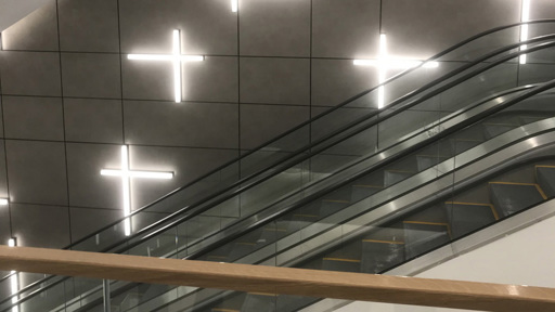 an escalator in a building