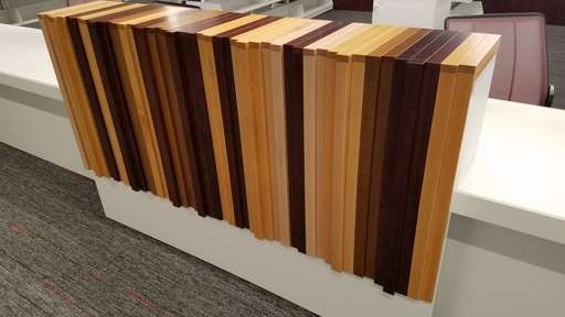 a reception desk with wood slats on it