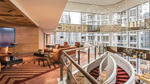 atrium lobby bronze couches and stair