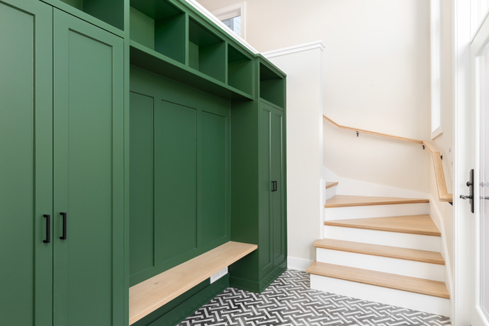 Cabinetry beside a staircase
