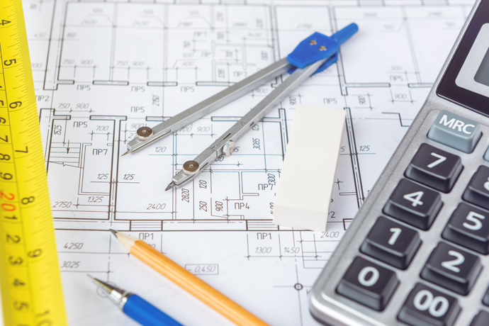A blueprint with measuring instruments