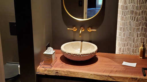 a bathroom sink and a mirror