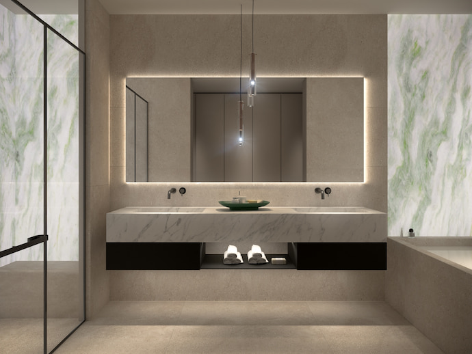 stone finished bathroom with large backlit mirror