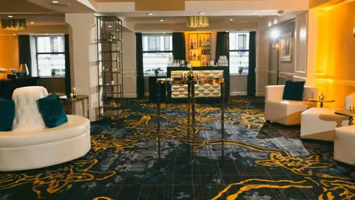 Custom woodworking wall trims in hotel reception area