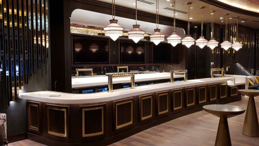 a bar in a hotel with a lot of lights