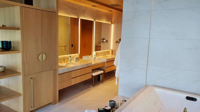 custom wood cabinetry and vanity in a newly renovated home bathroom